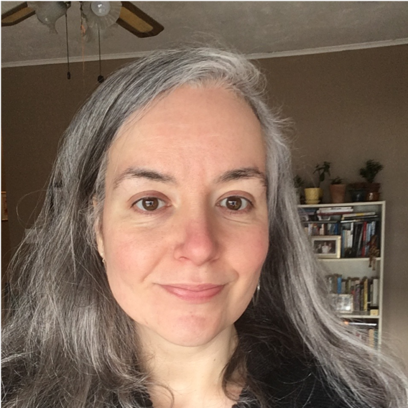 A headshot of Andrea White.