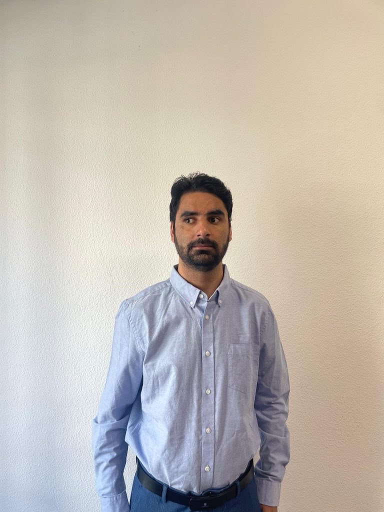 A photograph of Aqib Rehman.