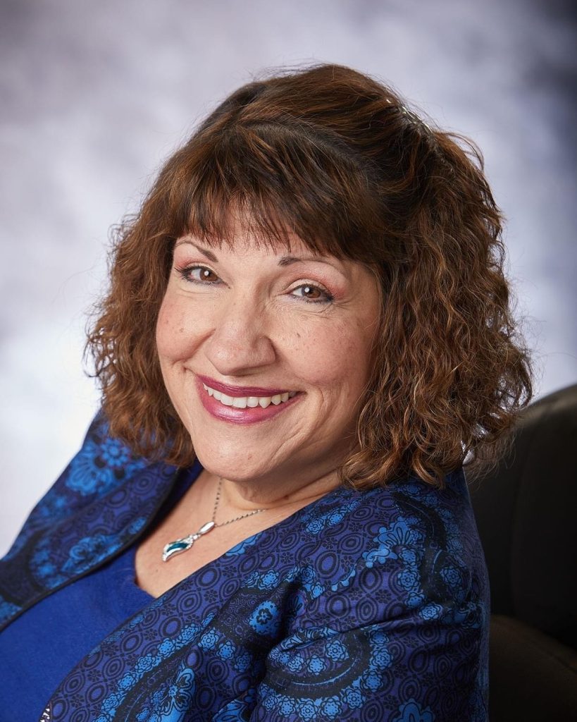 A headshot of Souraya Sue ElHessen.
